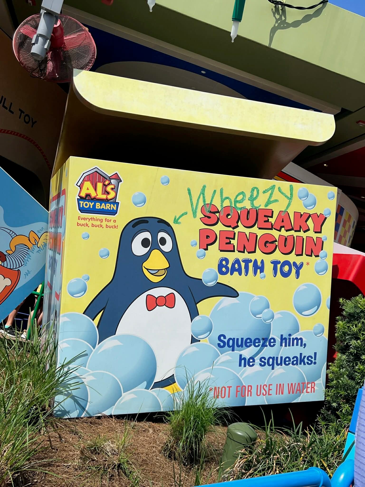 Wheezy the Squeaky Penguin sign in Toy Story Land